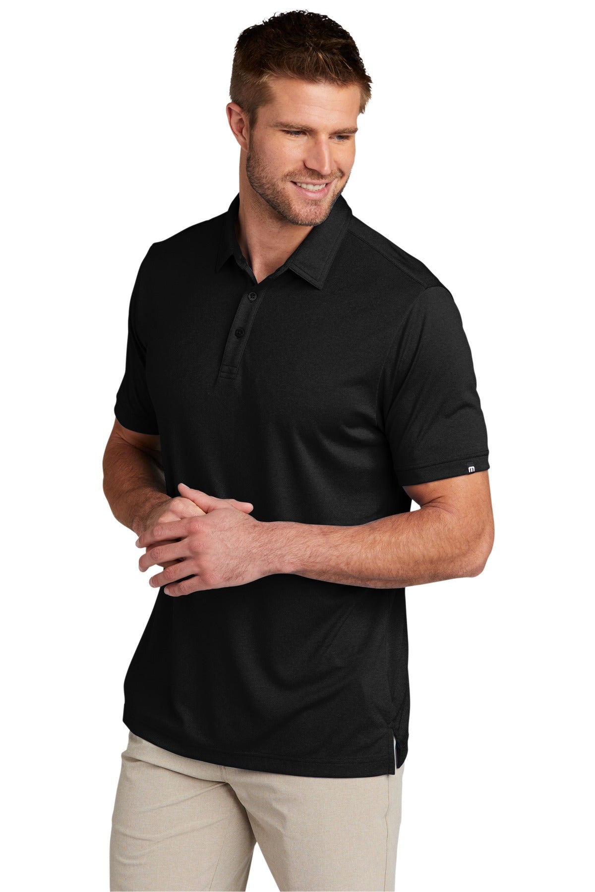 Black TravisMathew Coto Performance Polo. TM1MU410